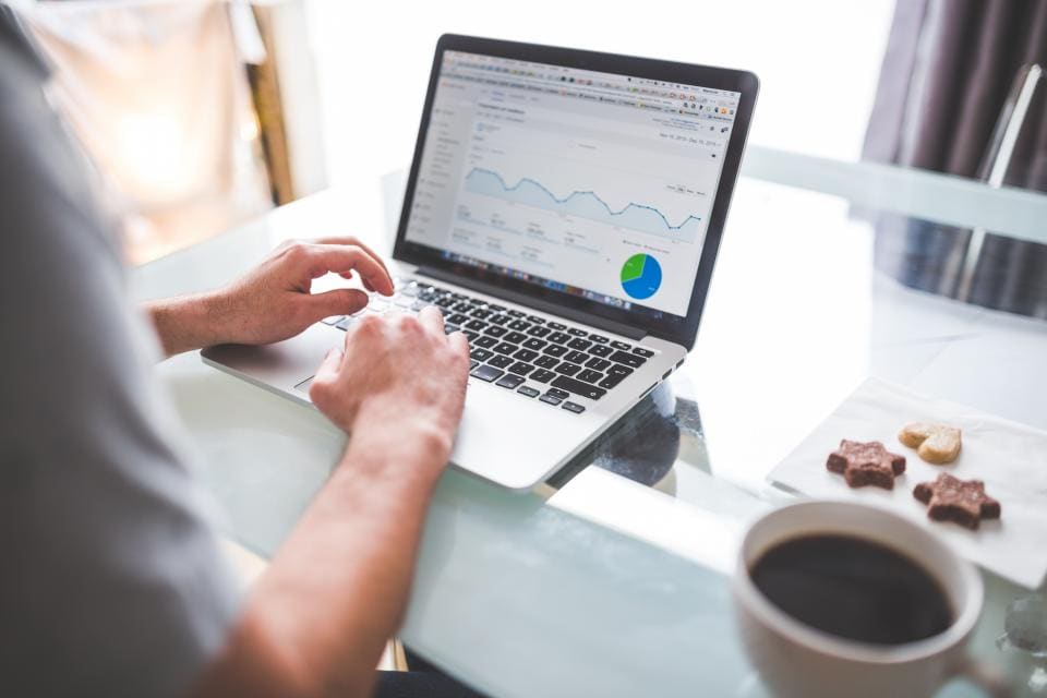 Laptop showing a website analytics dashboard